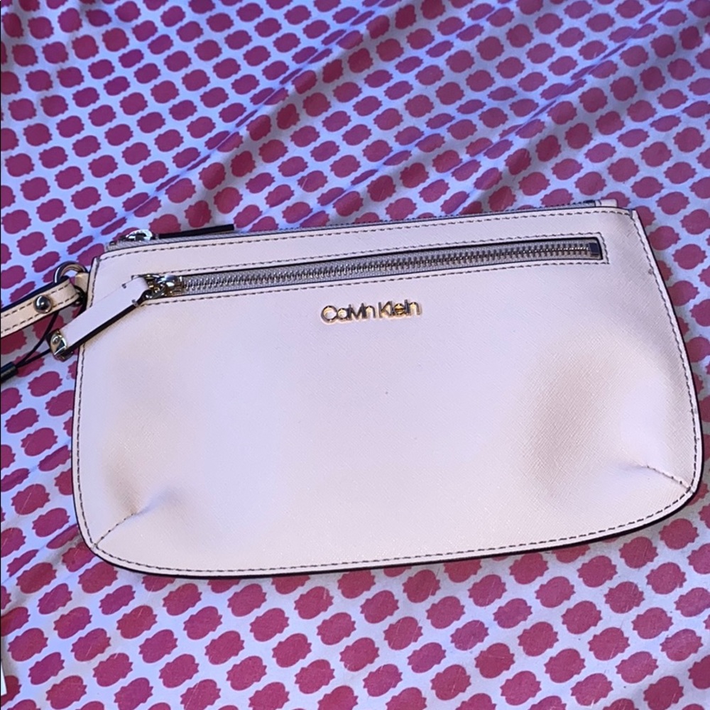 Calvin Klein light pink leather clutch